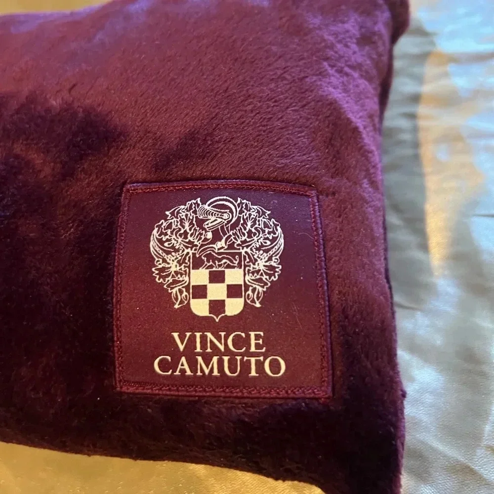 Vince camuto travel blanket with zipper storage bag.